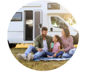 Family relaxing in front of an rv
